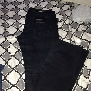 A pair of For all 7 mankind jeans